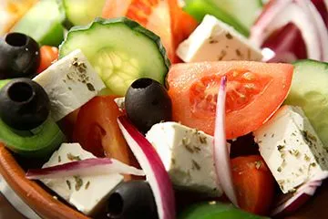 Fresh Greek salad with tomato, feta and olives